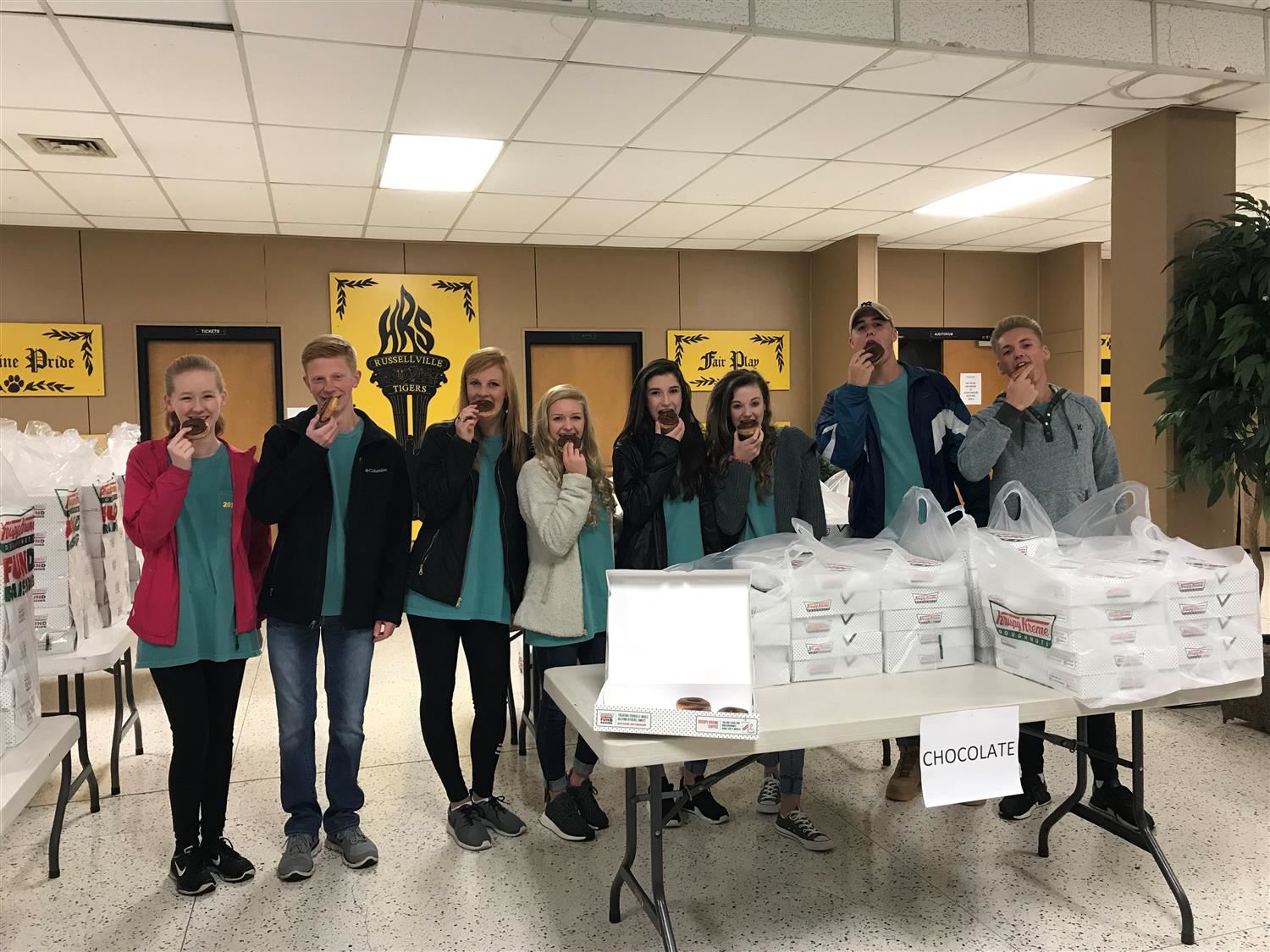 Officers working hard on Krispy Kreme Delivery Day.
